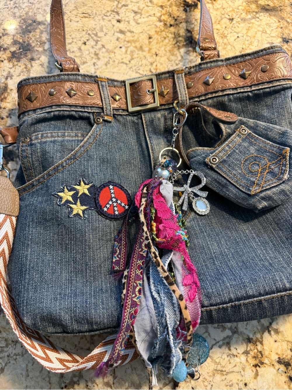Denim Hobo Bag with Embroidered Accents and Tassel Charm